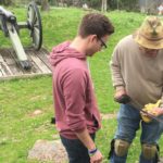 Taylor Agan and Philip Duer examine Jim Sobery's 1850 Union sabre