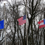Memorial flags at half-staff in honor of the fallen